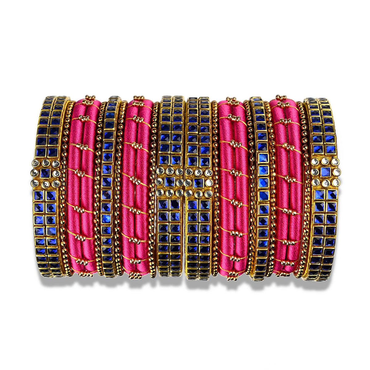 A divine set of silk thread bangles beautifully ornamented with pink silk thread and dark blue kundan stone bezels. The bangles comes in a set of 18 with 9 for each hand.